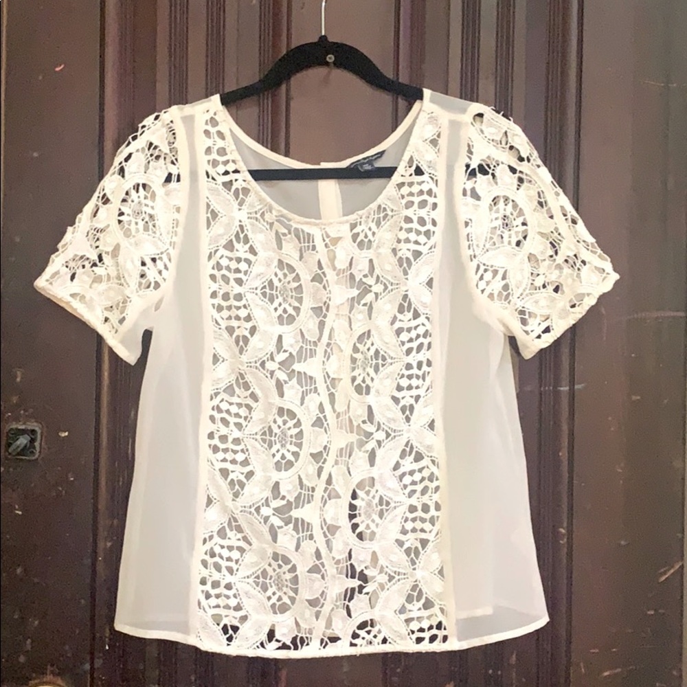 Sheer white lace blouse